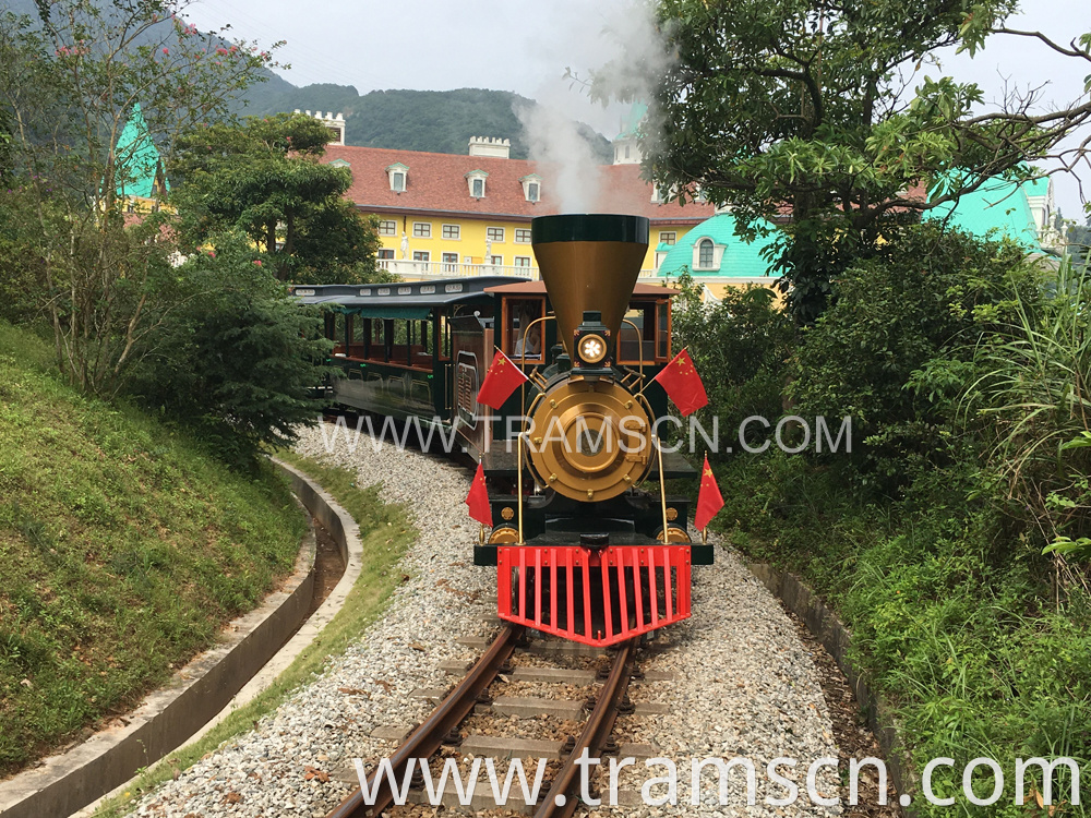 sightseeing train red and yellow colours railway